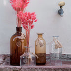 JARRON DECORATIVO TRANSPARENTE CON BORLA